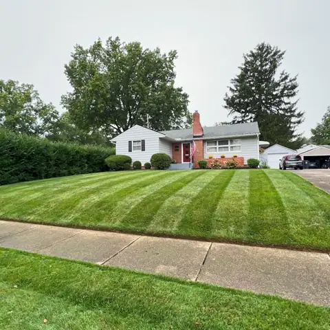 Fresh mowing stripes on a residential front lawn